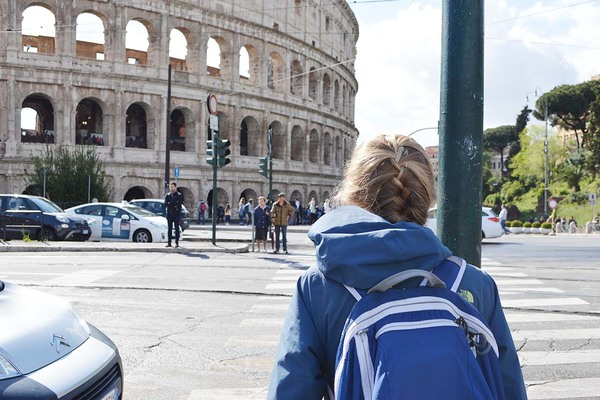 Walking By The Colosseum