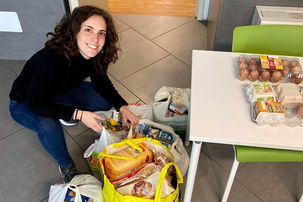 Rector Antonella Piccinin with food donations for the Piccole Sorelle dell’Agnello.
